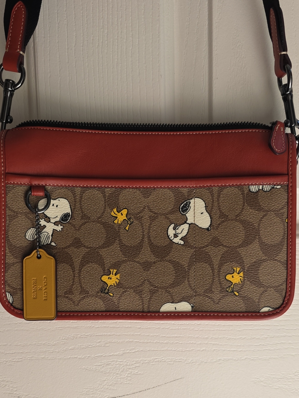 Coach Brown Signature Canvas Crossbody with ReddishBrown Trim and Yellow Accents